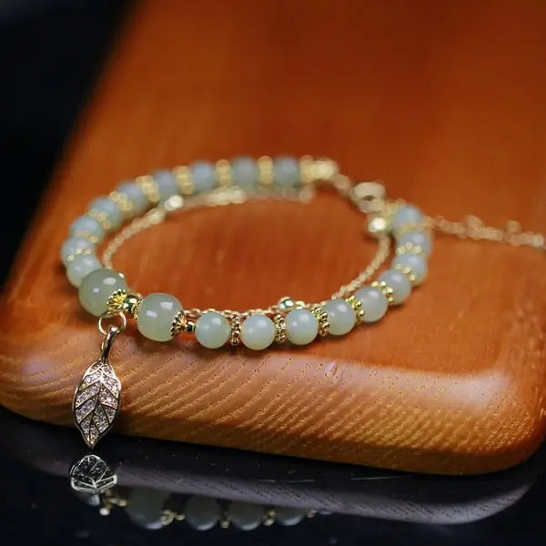 🔥KAUFEN SIE 2 UND ERHALTEN 10% RABATT💝Hetian-Jade-Goldblatt-Armband|🔥Lucky Jade Armband  🍀Feng-Shui-Jadearmband – elegant und noch edler cetaut