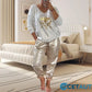 2-teiliges Damen-Set: Devil's Eye Goldfolien-Oberteil und Pailletten-Hosen-Set cetaut
